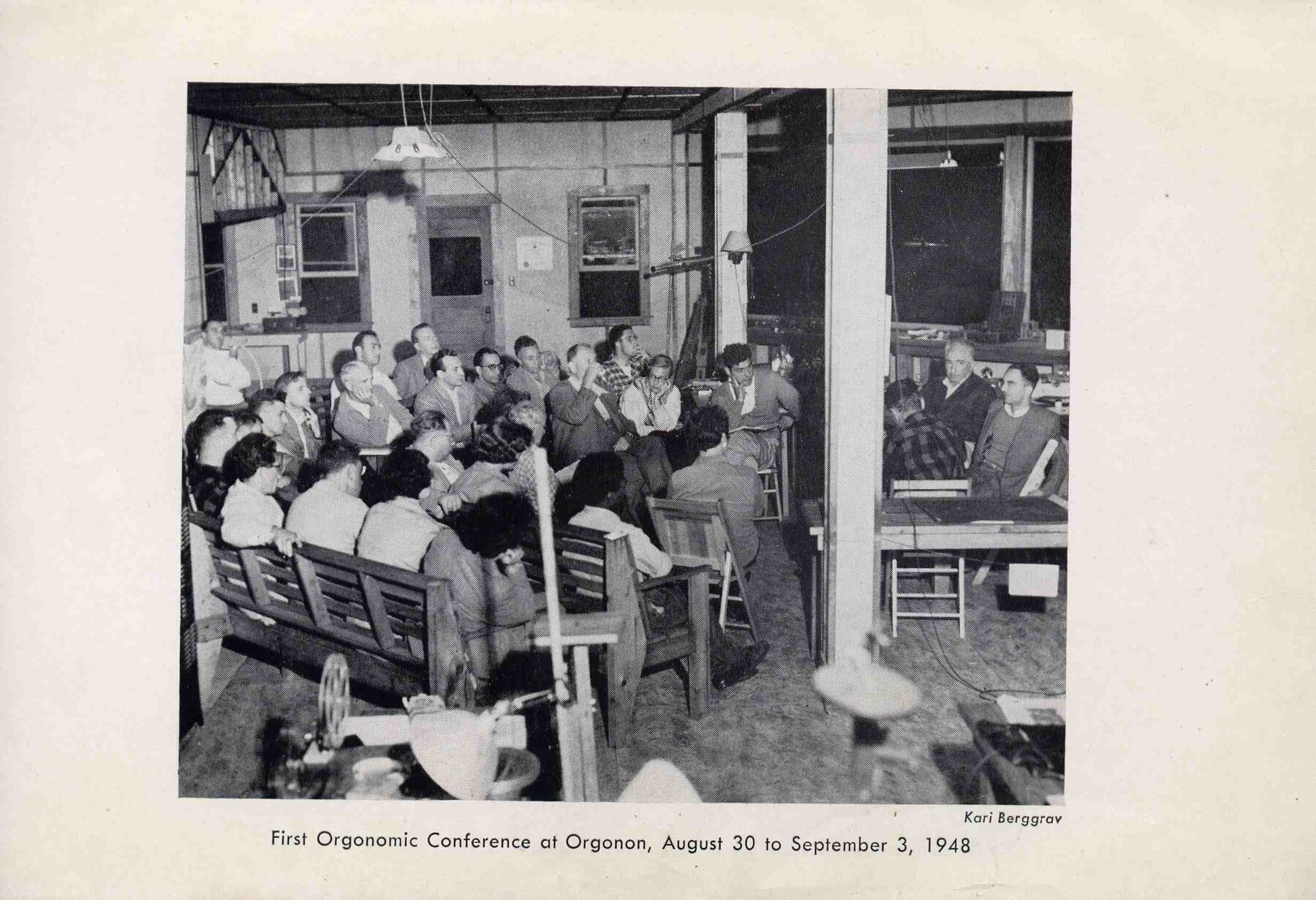 First Orgonomic Conference at Orgonon, August 30 to September 3, 1948 — attendees seated in the Students' Laboratory with a fluorescent light fixture overhead