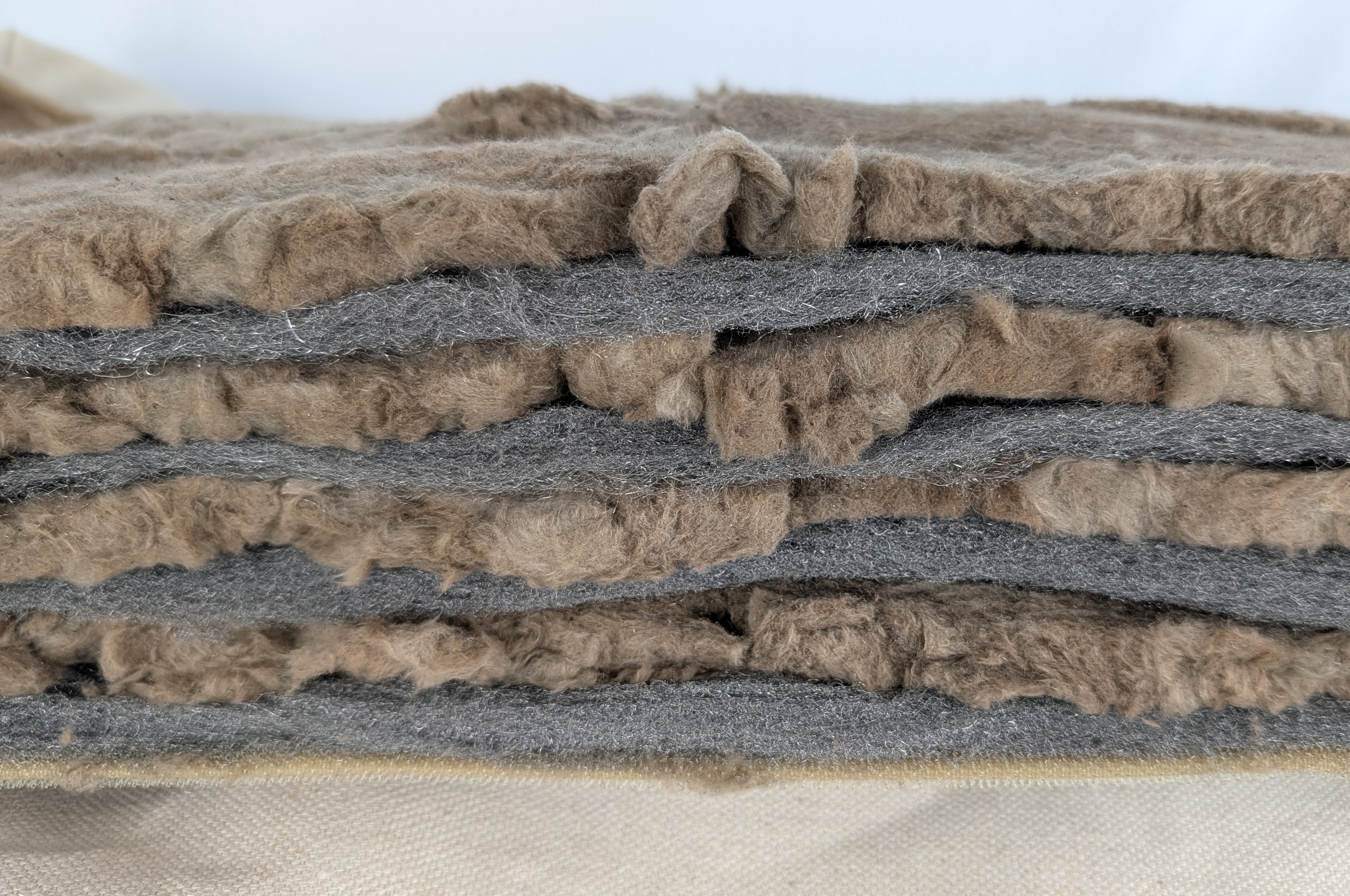 Edge-on view of the blanket's four alternating layers of rock wool and carbon steel wool