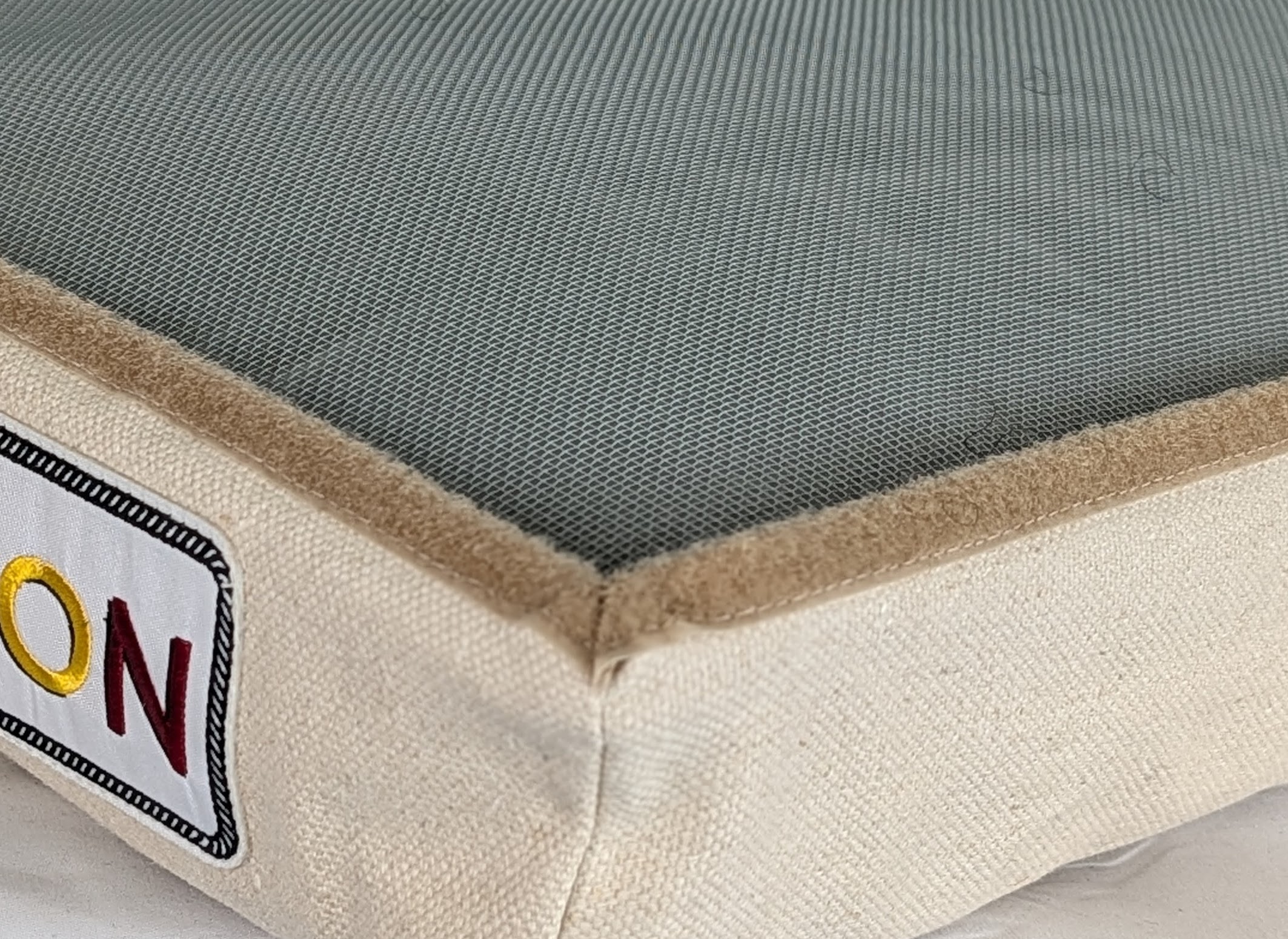 The galvanized steel screen edge with Velcro closure detail