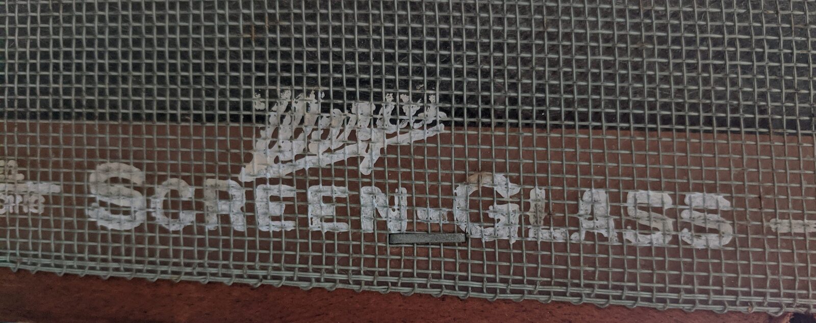 Warp's Screen-Glass stencil visible on the screen of an original accumulator
